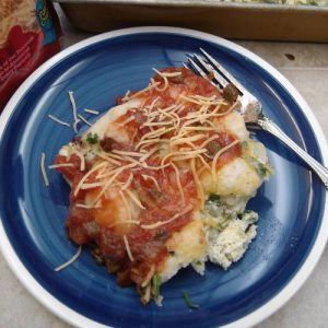 serving of breakfast casserole on blue plate