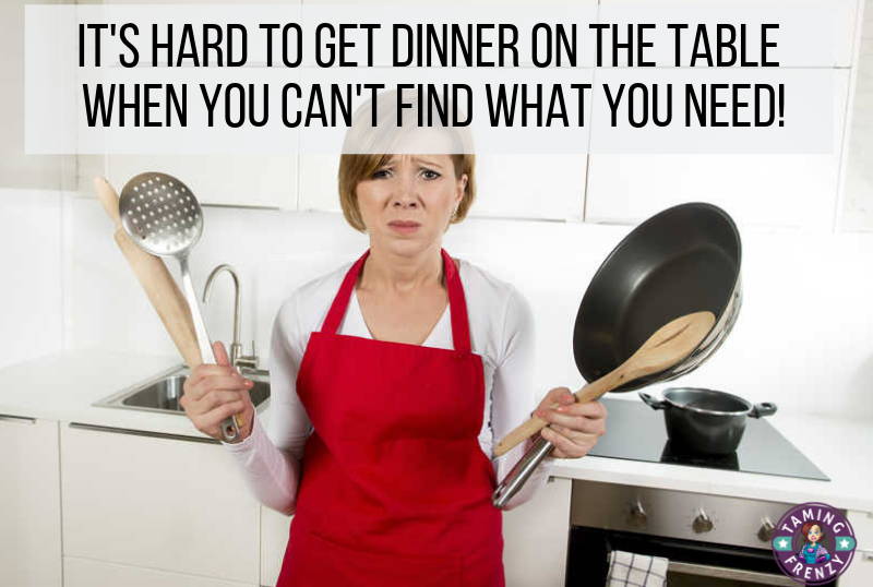 frustrated woman holding kitchen items