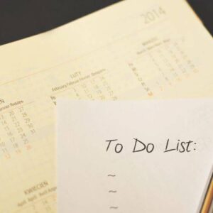 To Do list laying on top of manilla folder