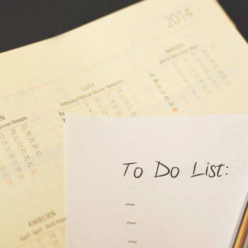 To Do list laying on top of manilla folder