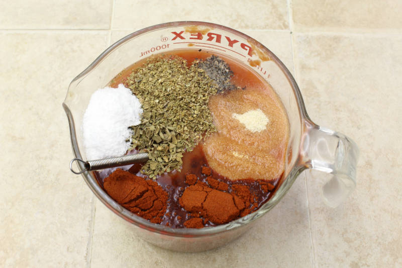 mix spices with tomato sauce