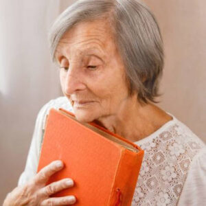 feature image old woman holding album
