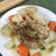 chicken campfire dinner served on a white plate