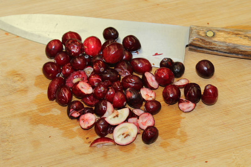 cranberries o cutting board