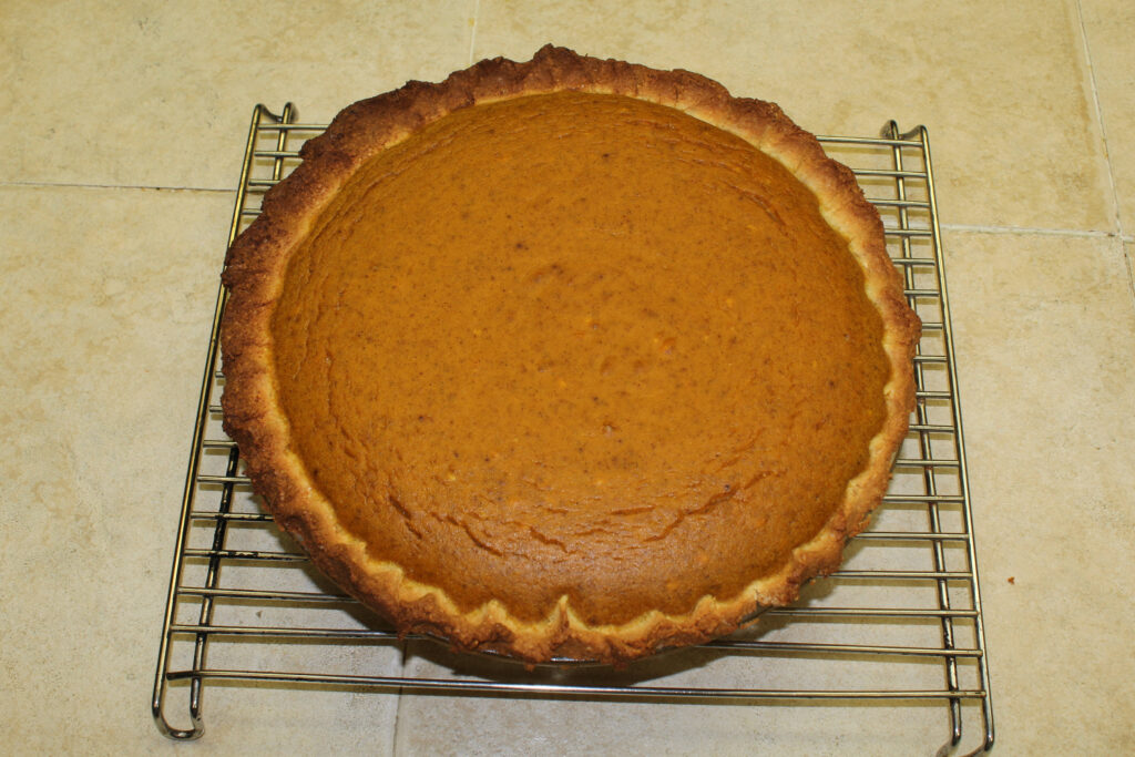 finished keto pumpkin pie on cooling rack