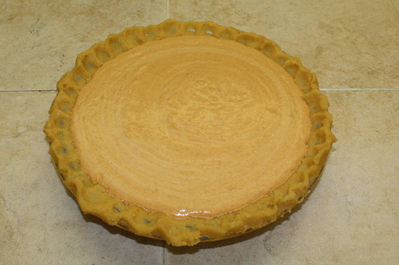 keto pumpkin pie ready to go in the oven
