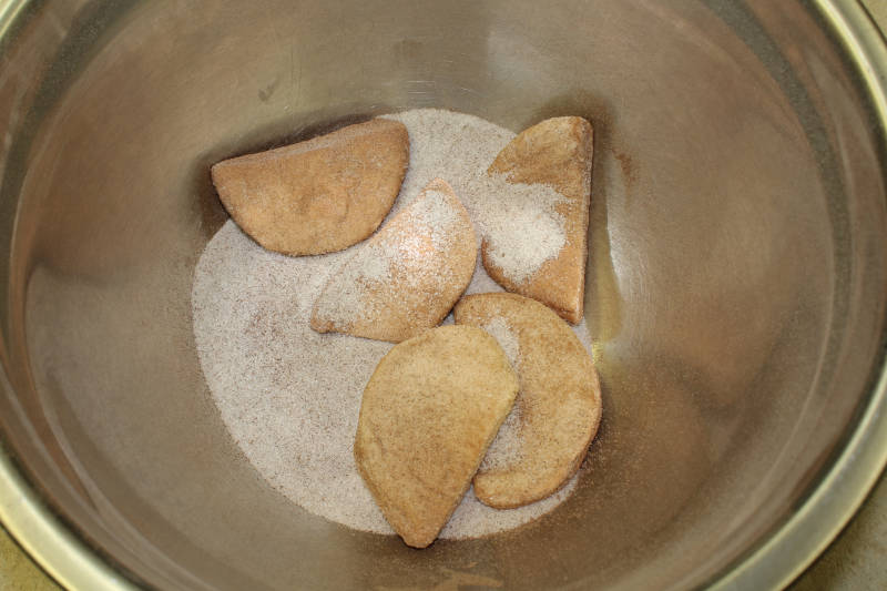 raw biscuits rolled in spices